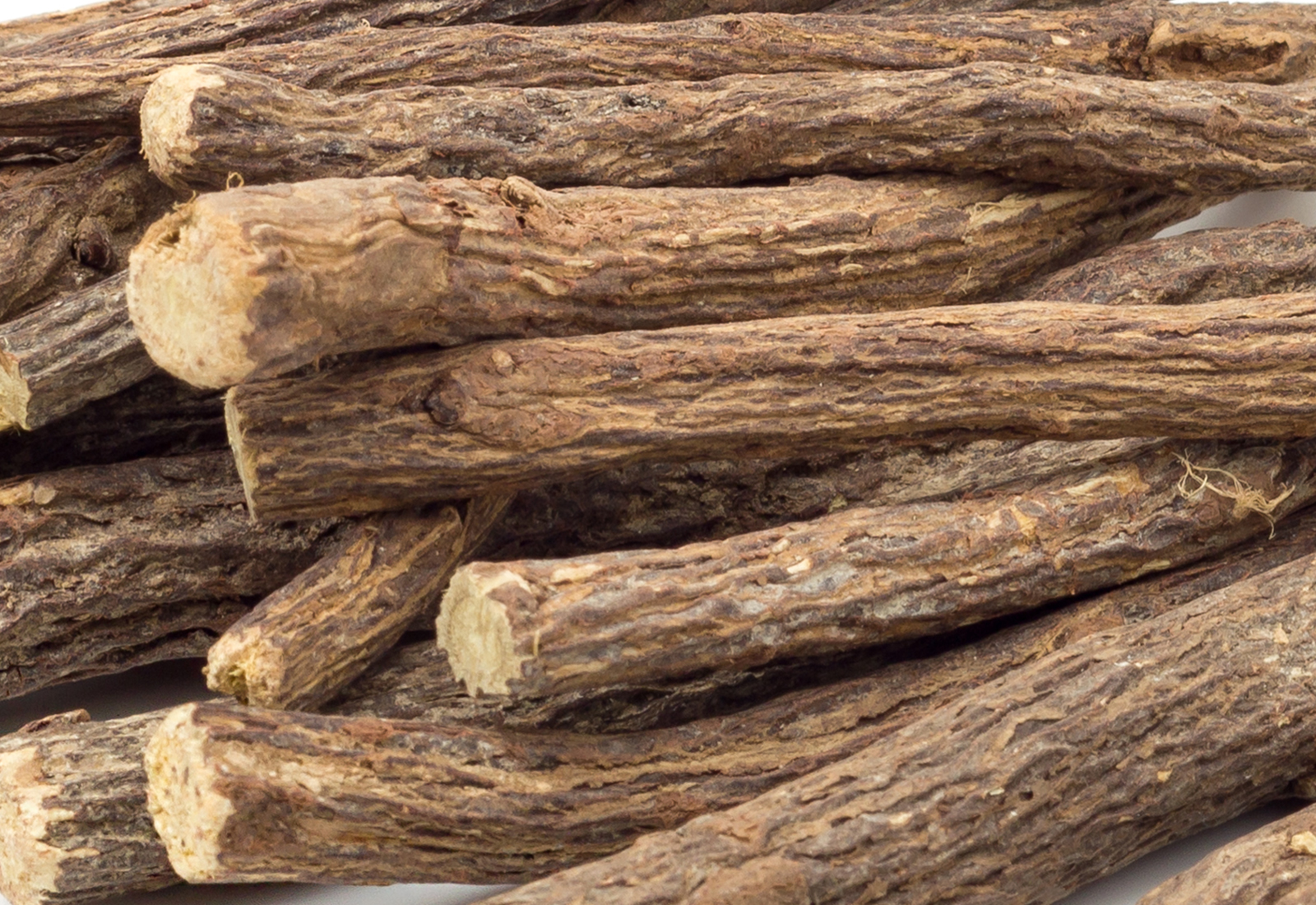 Liqorice roots on white background